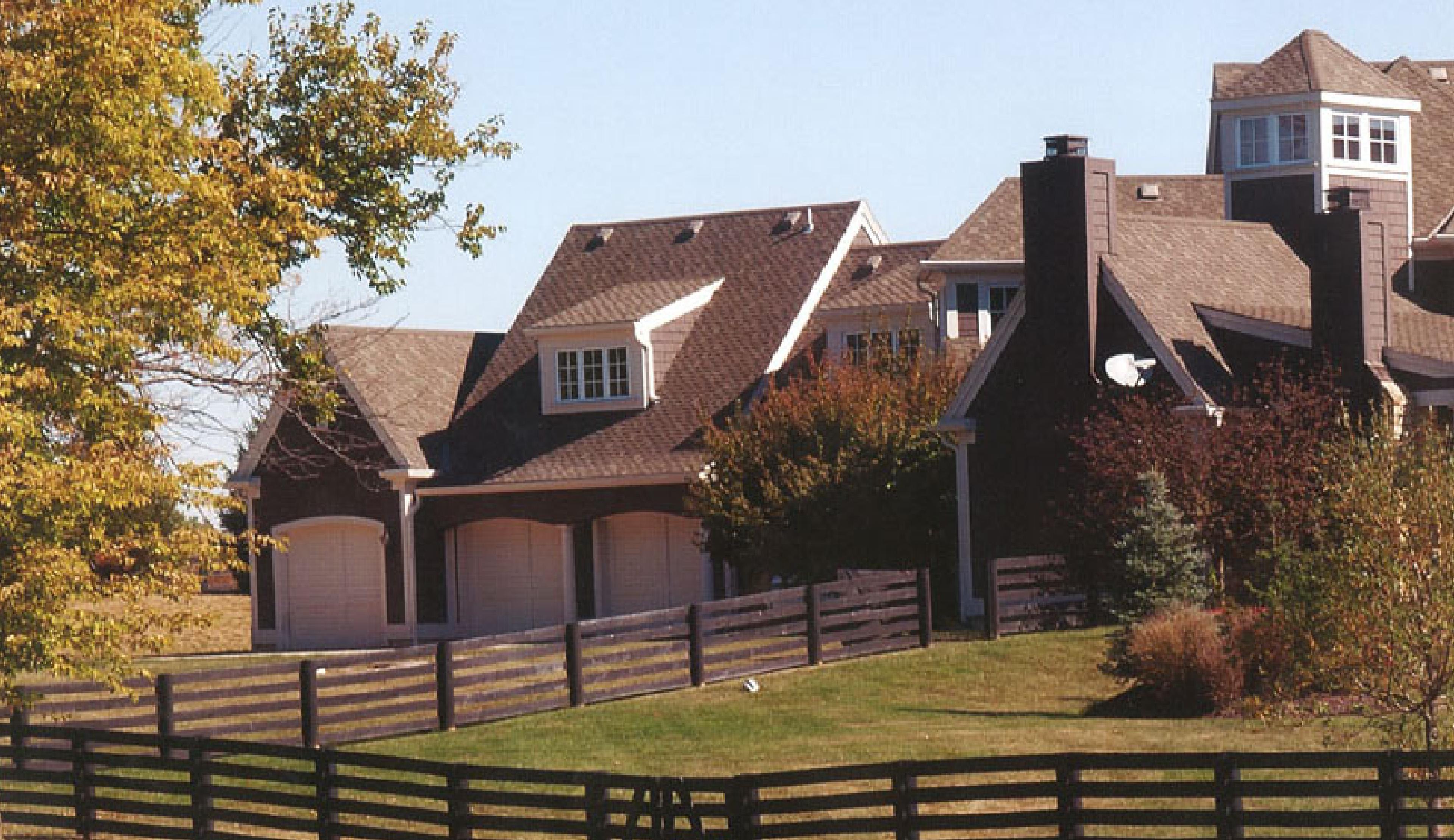 Large suburban house with brown roof