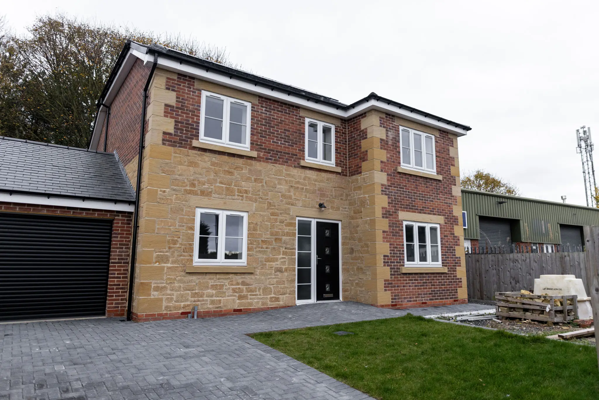 Two-story brick house with garage